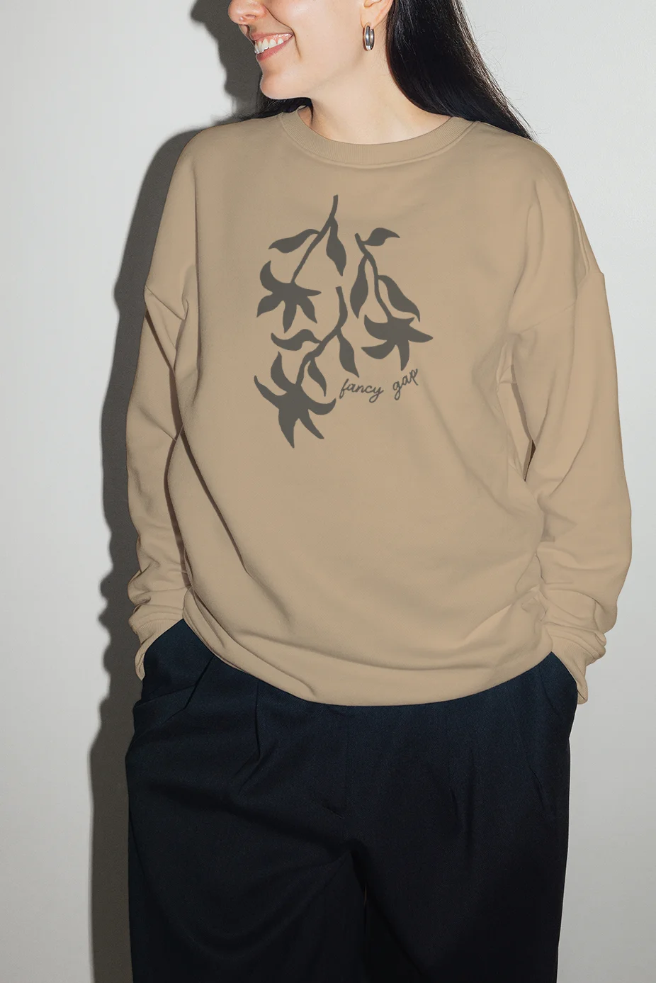 Woman wearing a Fancy Gap crewneck sweatshirt. Part of the Merch Shops by Press Press Merch
